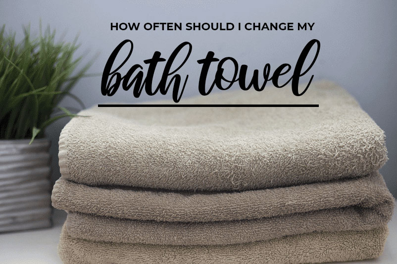 An image showing a stack of towels for the blog post by heatandplumb.com titled how often should i change my bath towel