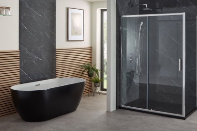 An image showing a sliding shower door and shower panel in a luxury bathroom scene | Article Image