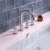 Delphi Axiom Dual Lever Chrome 4-Hole Deck Mounted Bath Shower Mixer Tap (inc Kit) | Thumbnail Image