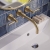 Delphi Axiom Dual Lever Brushed Brass 3-Hole Wall Mounted Basin Mixer Tap | Thumbnail Image
