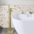 Delphi Loop Brushed Brass Freestanding Bath Shower Mixer Tap (inc Kit) | Thumbnail Image
