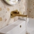 Delphi Loop Brushed Brass 2-Hole Wall Mounted Basin Mixer Tap (inc Backplate) | Thumbnail Image