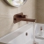 Delphi Loop Brushed Bronze 2-Hole Wall Mounted Basin Mixer Tap (inc Backplate) | Thumbnail Image