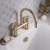 Delphi Turbine Brushed Brass Pillar Mounted Bath Filler Tap | Thumbnail Image