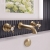 Delphi Windsor Crosshead Brushed Brass 3-Hole Wall Mounted Bath Filler Tap | Thumbnail Image