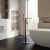 Nuie Binsey Freestanding Bath Shower Mixer Tap with Shower Kit - Brushed Bronze | Thumbnail Image