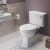 Signature Aphrodite Comfort Height Close Coupled Toilet with Lever Cistern - White Satin Soft Close Seat | Thumbnail Image