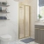 Signature Verve Brushed Brass Bi-Fold Shower Door - 5mm Glass