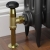 West Old School Black and Brass Radiator Valve and Lockshield 1/2 Inch - Un-Lacquered Brass | Thumbnail Image